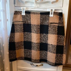 Black and tan plaid skirt